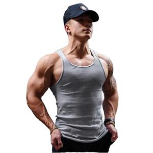Camiseta sin mangas acanalada gris para hombre, cuello redondo, informal, transpirable, de punto, para entrenamiento muscular, color liso, de algodón, de secado rápido, ajuste cómodo, frontal - Product Image 1