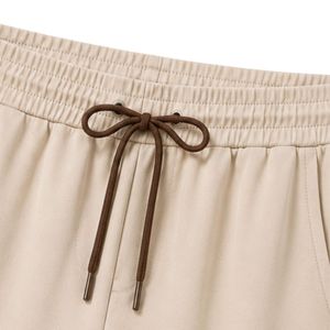 Ensemble décontracté deux pièces beige et marron pour femme : T-shirt oversize et pantalon large avec rayures contrastées - Product Image 6