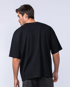 เสื้อยืดทรงหลวมสไตล์วินเทจ แขนเสื้อแบบดรอปโชว์เดอร์ ใส่สบายสำหรับฤดูร้อน - Product Image 1