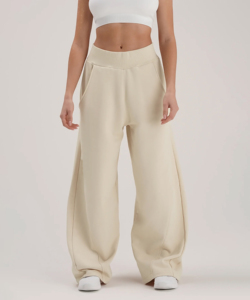 Pantalones deportivos de mujer de algodón 100% de primera calidad, cintura elástica, pierna ancha, color beige marfil, estilo holgado. - Product Image 1