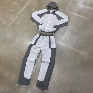 Conjunto de Dos Piezas de Chaqueta y Pantalones Deportivos de Nailon con Cremallera Personalizada, Traje Deportivo Ligero Cortavientos, Fabricante de Ropa Deportiva - Product Image 1