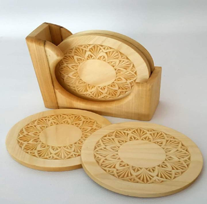 Hand carved dark wood floral coasters featuring a white <b>star</b> center are available at wholesale prices for bohemian collectors. - Product Image 3