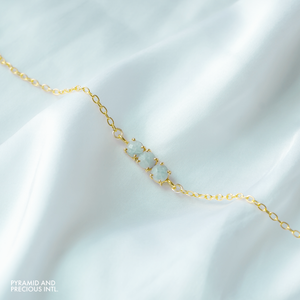 สร้อยข้อมือพลอยอะความารีนประจำเดือนเกิด - สร้อยเงินแท้ 925 แบบสั่งทำพิเศษ |   สร้อยข้อมือประดับจี้แบบสามหัวกรงเล็บ - Product Image 1