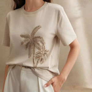 Camiseta de algodón color crema para mujer, manga corta, con gráfico de palmera con cuentas doradas, informal, de verano, cuello redondo, top tipo pullover. - Product Image 1