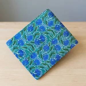 Vibrant Blue Floral Printed Cotton Fabric with Green Leaf Motifs for Dresses Sewing Quilting Crafts and Home Decor Projects Use - Product Image 5