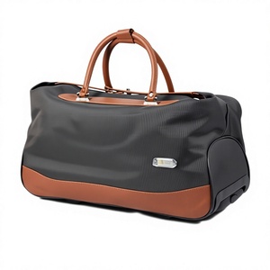 Bolsa de Lona Negra de Nailon con Detalles en Cuero Marrón, Asa Superior, Cierre de Cremallera, Resistente al Agua, Mochila de Viaje Unisex, Forma Rectangular - Product Image 1