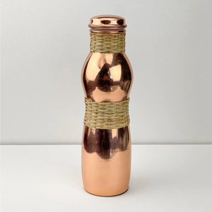 Modern Copper Bottle High Rattan Design Top And Neck Designer Direct Drinking Eco-Friendly Daily Use Party Ready with Lid - Product Image 1