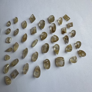Le lot de rutile doré de 209 carats et 40 pièces de qualité AA, destiné aux fins thérapeutiques et aux tailles allant de 7x12 à 13x17. - Product Image 2