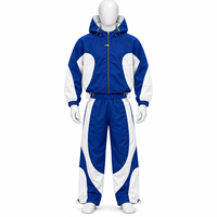 Ensemble survêtement streetwear imperméable pour homme 2026 : veste coupe-vent oversize et pantalon à ourlet zippé ajustable