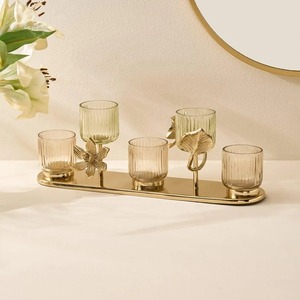 Candelabro moderno de metal y vidrio, ideal para decorar mesas de esquina y rellenar espacios vacíos con elegancia, procedente de la India. - Product Image 3