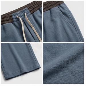 Pantalon de survêtement large droit évasé en molleton de coton 500gsm à slogan personnalisé pantalon de survêtement ample à double taille pantalon d'hiver pour hommes - Product Image 4