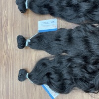 Prix usine noir naturel ondulé trame Extensions de cheveux 100% cheveux vietnamiens Super haute qualité très soyeux pas d'enchevêtrement prêt à expédier
