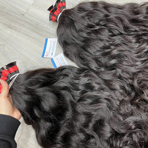 Precio al por mayor Natural Black Raw Bundle Hair Extensiones de cabello a granel vietnamitas Sin enredos Sin desprendimiento Super sedoso Listo para enviar - Product Image 1
