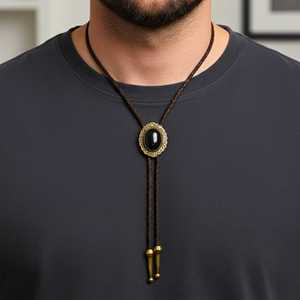 Black Heritage Bolo Tie 1.5 Inch Stainless Steel Pendant with Adjustable Brown Leather Rope for Men & Boys - Product Image 1