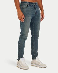 Jeans de Hombre Slim Fit, Denim Elástico Suave, Estilo Desgastado, Corte Ajustado, Estilo Urbano, Cómodos, con Decoración Bordada - Product Image 1