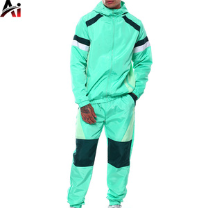 Conjunto Deportivo Personalizado para Hombre, Chaqueta Ligera de Nailon y Pantalones Deportivos para Entrenamiento en el Gimnasio - Product Image 4