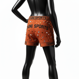 Shorts pour femmes en tissu polyester et élasthanne hautement extensible, toucher doux, couleur rouille, logo en cristal thermocollé. - Product Image 5