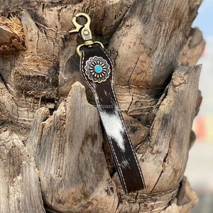 พวงกุญแจหนังวัวแท้ใหม่ทำมือแท้แท้น่ารักมีเสน่ห์พร้อมสายคล้องข้อมืออุปกรณ์เสริมสไตล์ตะวันตก - Product Image 2