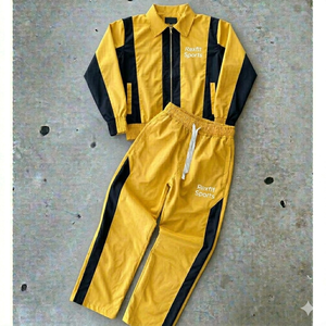 OEM Lightweight Cotton Printed Winter Windbreaker <b>Jackets</b> & Track Pants Set Custom <b>Patchwork</b> Jogging Windbreaker Tracksuits - Product Image 1