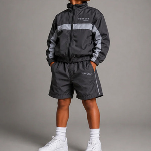 Ensemble de survêtement coupe-vent personnalisé pour enfants, couleur unie, avec passepoil et fermeture éclair, veste et short, en softshell polyester-nylon, tenue décontractée pour l'automne - Product Image 1
