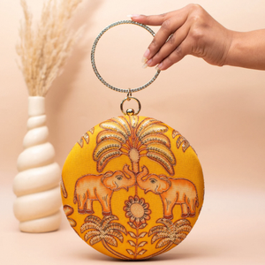 Yellow Elephant Embroidered Round Clutch Premium Fabric <b>Handbag</b> with Raw Silk Interior Dual Side Design and Sling <b>Chain</b> - Product Image 1