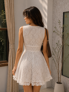 Vestido midi de encaje blanco con corpiño sin mangas, detalle de lazo frontal y dobladillo acampanado para moda casual de verano y ropa de vacaciones. - Product Image 1