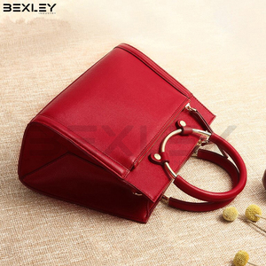 Structured Fashionable Burgundy Red Handbag <b>With</b> Circular Metal Top Handle, Front <b>Zip</b> Pocket and Adjustable Shoulder Strap - Product Image 5