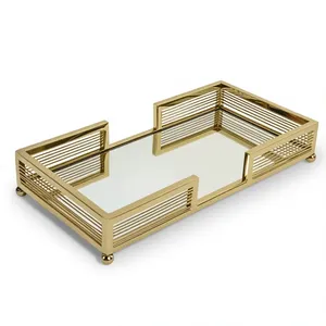 Bandeja Decorativa Rectangular de Latón Dorado con Bordes Calados a Rayas y Patas de Bola para Almacenamiento de Cosméticos - Product Image 1