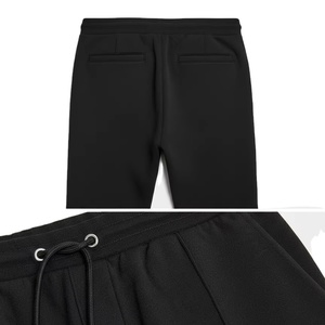 Pantalon de jogging noir à plis pour homme |   Pantalon de survêtement fuselé à taille élastique avec cordon de serrage pour tenue décontractée et sportive - Product Image 1