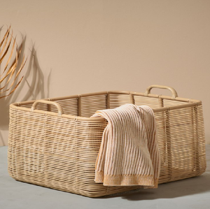 Wide <b>rectangular</b> fine-woven rattan laundry <b>basket</b> with integrated side handles, available at wholesale prices. - Product Image 1