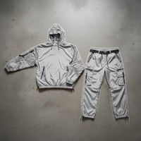 Ensemble de survêtement léger OEM personnalisé imperméable avec capuche, coupe-vent zippé et pantalon ample pour homme, motif color block flamme