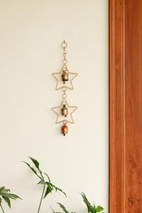 Decoración de pared artística con estrella colgante de hierro moderna, adecuada para hogares contemporáneos, cafeterías y espacios de boutique. - Product Image 5