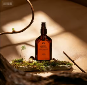 Huile Essentielle pour Cheveux à l'Argan en Spray 50 ml, Sérum Capillaire Non Collant, Protection Thermique pour Cheveux Colorés - Product Image 1