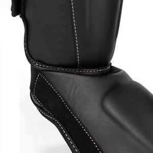 Protège-tibias de kick-boxing en cuir noir avec bande rouge, fermeture auto-agrippante réglable, pour adultes unisexe, arts martiaux - Product Image 6