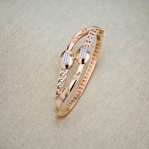 Rose gold plated ladies <b>bangle</b> with dual oval <b>charm</b> chic designer womens jewellery stylish lightweight bracelet - Product Image 3