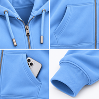 Sweat à capuche zippé de qualité supérieure bleu clair pour femme, en polaire, avec cordon de serrage, poche kangourou et épaules tombantes