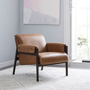 Fauteuil lounge en cuir de style Mid-Century avec structure en teck massif et accoudoirs sculptés - Product Image 1