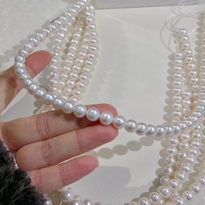 สร้อยคอมุกน้ำจืดขนาด 8-9 มม. ที่ละเอียดอ่อน สีขาวสว่าง พร้อมแสงอุ่นที่แข็งแกร่ง ใกล้เคียงกับทรงกลม ปราศจากแกนกลางเล็กน้อย - Product Image 4