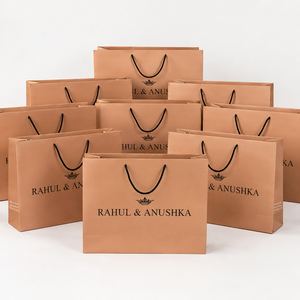 Wholesale Luxury Paper Carry <b>Bags</b> with Custom Name Printing Black Rope Handles for Wedding <b>Gifts</b> and Boutique Packaging - Product Image 1