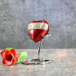 Heart shaped decorative urn with floral engraved design and soft finish ideal for <b>memorial</b> keepsake display adding elegance love - Product Image 2