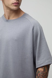 Camiseta de algodón grueso para hombre, de corte holgado, hombros caídos, estilo casual y urbano para verano. - Product Image 3