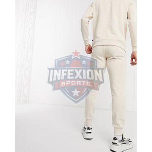 Pantalon de survêtement unisexe en coton crème avec poches latérales, taille élastique, coupe décontractée, idéal pour l'automne - Product Image 3