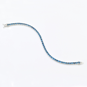 Bracelet tennis unisexe de haute qualité en argent sterling 925 avec topaze bleue de Londres naturelle ovale certifiée IGI, idéal pour les soirées - Product Image 2