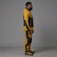 Ensemble survêtement ample personnalisé à blocs de couleur, veste coupe-vent zippée et pantalon de jogging ample en nylon, style streetwear oversize