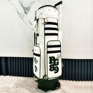 Sac de golf professionnel en cuir synthétique blanc avec organisation multi-poches et base renforcée - Product Image 1