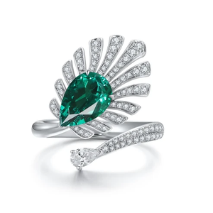 Luxury Women's White Gold Cocktail Ring With Pear Cut Emerald And Diamond Wings Pave Setting - Product Image 1