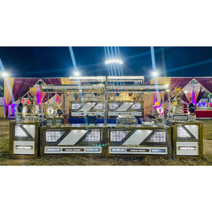 Configuración de mostrador tipo buffet con gabinetes modernos y estructurados, paneles decorativos y elementos iluminados. - Product Image 1