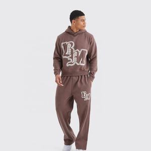 Pantalon de survêtement personnalisé écologique de grande taille Econex Ensemble de jogging à capuche imprimé pour hommes Motif solide à jambe large Hiver - Product Image 1