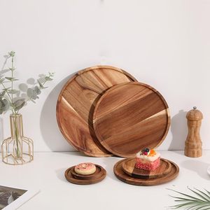 Ensemble de plateaux de service ronds en bois, design minimaliste verni, empilables, pour la présentation des aliments sur table - Product Image 1