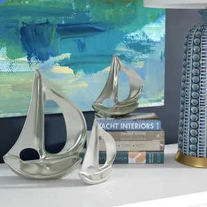 Sculpture d'art moderne en métal en forme de voilier, plaquée argent, décoration d'intérieur, acier inoxydable poli, forme irrégulière - Product Image 4